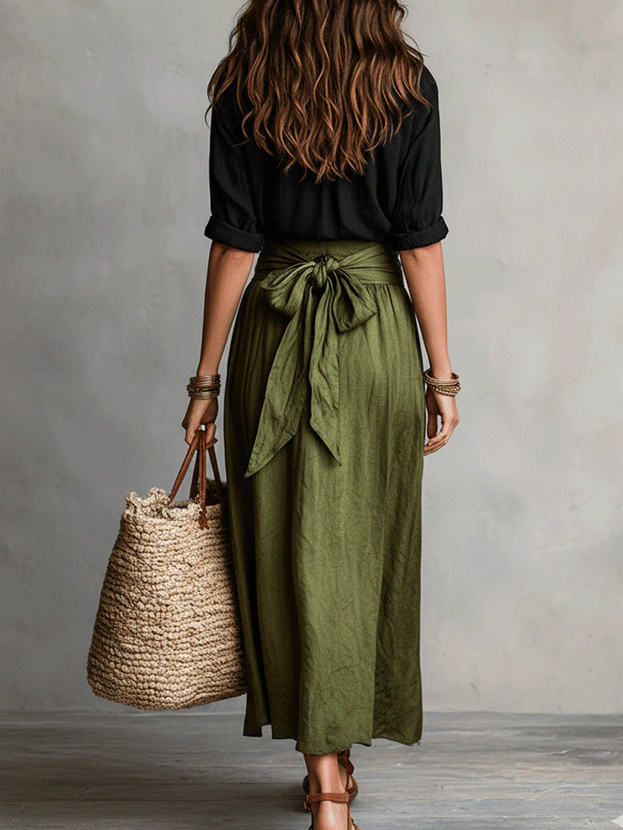 Conjunto de dos piezas con camisa negra y falda midi para mujer