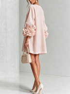 Minivestido con estampado floral y botones, con llamativos puños florales.