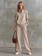 Conjunto de chaqueta de felpa con cremallera y pantalón ancho con franjas marrones