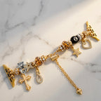 Pulsera con dijes dorados para Apple Watch, cruz adornada con perlas, estrellas brillantes, cuentas de leopardo, bola de billar, cierre corredizo ajustable, modelo Junia