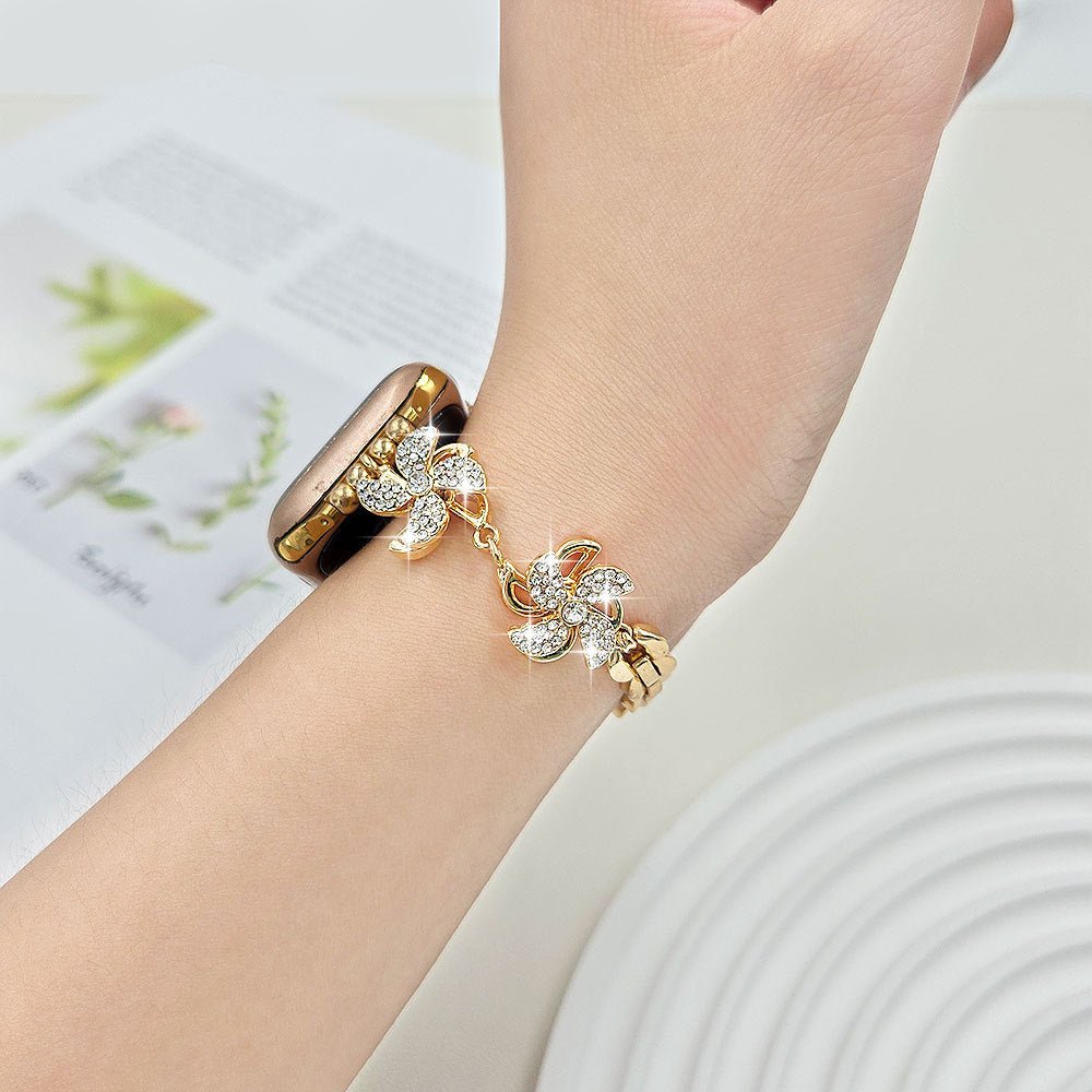 Correa Apple Watch de aleación metálica, flor de loto giratoria, eslabones ajustables a presión, para mujer, modelo Lossia