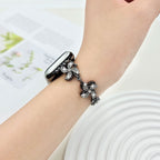 Correa Apple Watch de aleación metálica, flor de loto giratoria, eslabones ajustables a presión, para mujer, modelo Lossia