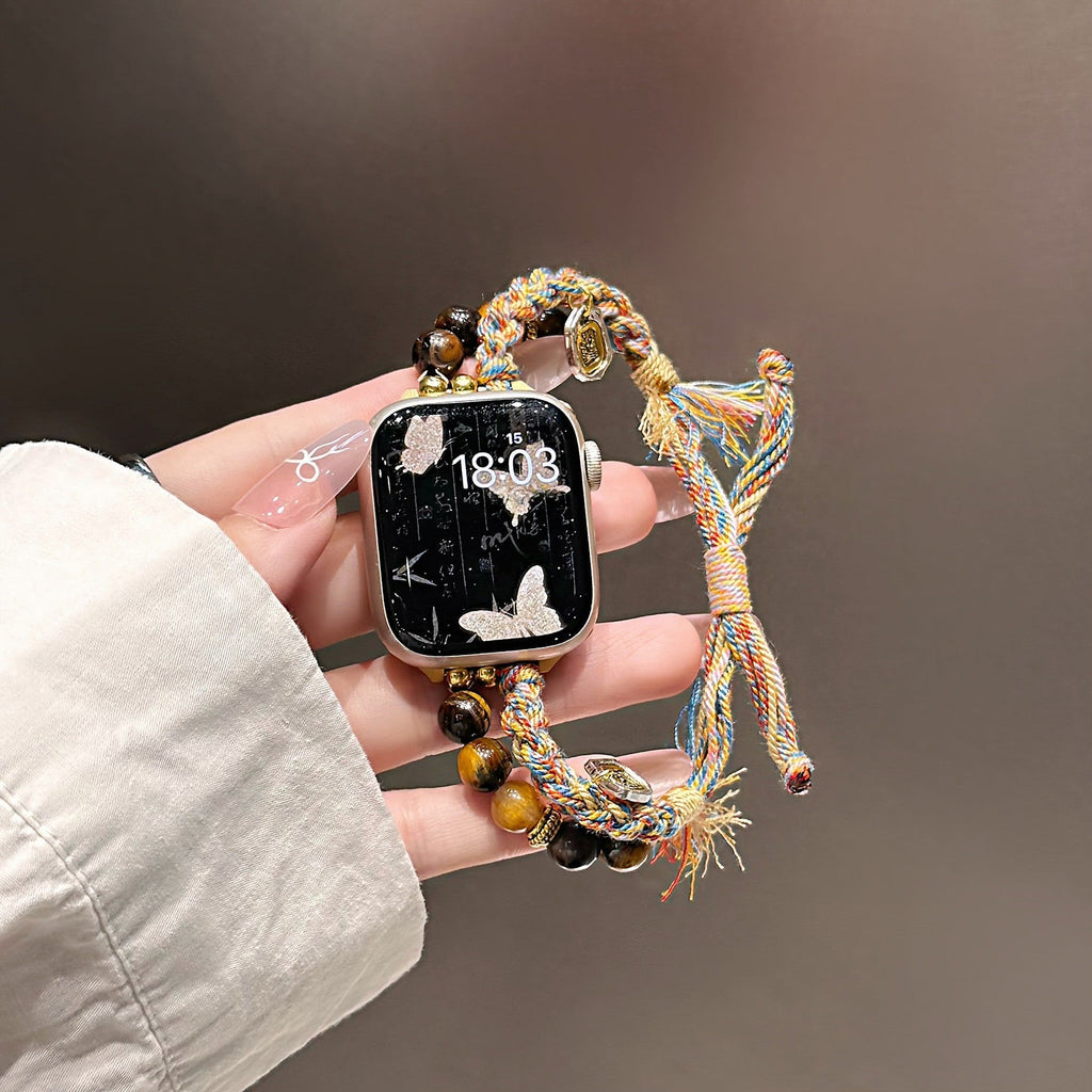 Correa Apple Watch de Ojo de Tigre natural, cordón trenzado multicolor, charms dorados, modelo Tenzin