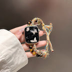 Correa Apple Watch de Ojo de Tigre natural, cordón trenzado multicolor, charms dorados, modelo Tenzin