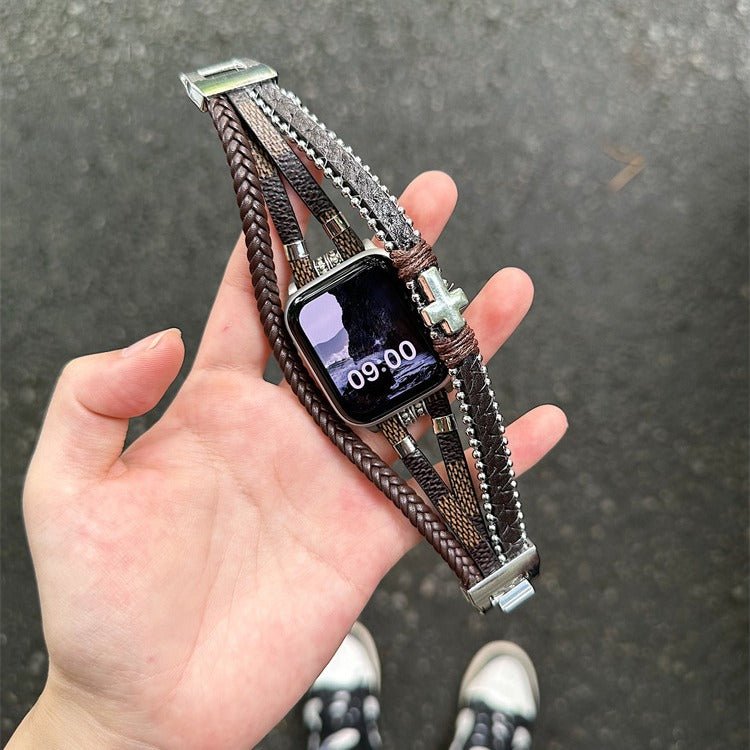 Correa Apple Watch de piel vegana trenzada, multivuelta con cruz metálica, look atrevido y moderno, modelo Daxo