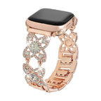 Correa Apple Watch para mujer de metal, motivo de tréboles engastados con circonitas brillantes, malla fantasía elegante, modelo Yadna