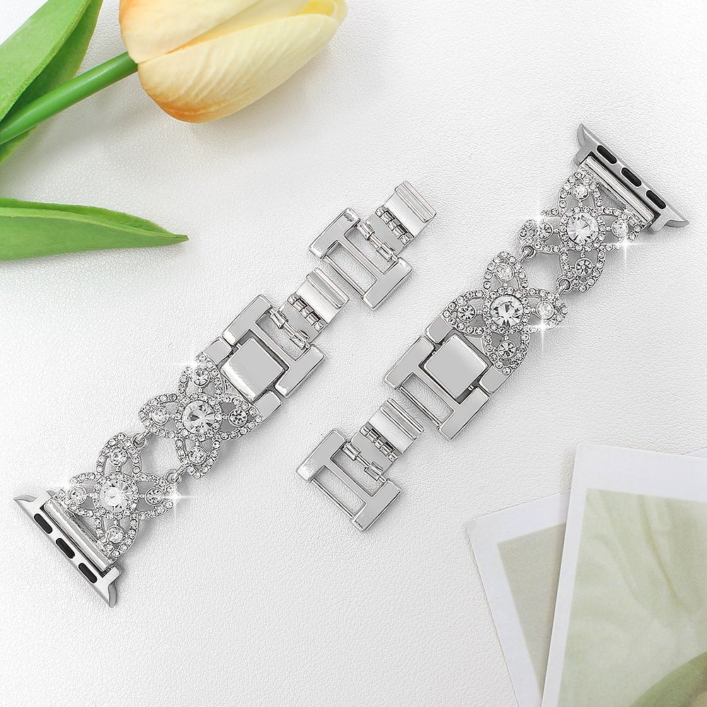 Correa Apple Watch para mujer de metal, motivo de tréboles engastados con circonitas brillantes, malla fantasía elegante, modelo Yadna