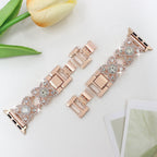 Correa Apple Watch para mujer de metal, motivo de tréboles engastados con circonitas brillantes, malla fantasía elegante, modelo Yadna