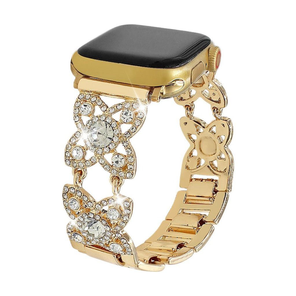 Correa Apple Watch para mujer de metal, motivo de tréboles engastados con circonitas brillantes, malla fantasía elegante, modelo Yadna