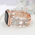 Correa Apple Watch para mujer de metal, motivo de tréboles engastados con circonitas brillantes, malla fantasía elegante, modelo Yadna