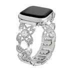 Correa Apple Watch para mujer de metal, motivo de tréboles engastados con circonitas brillantes, malla fantasía elegante, modelo Yadna