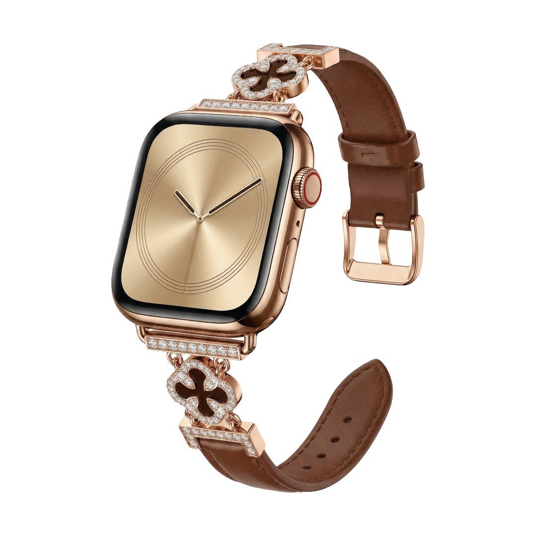 Correa Apple Watch para mujer en material sintético charolado, motivo trébol pavé de circonitas, aleación dorada elegante, modelo Circé
