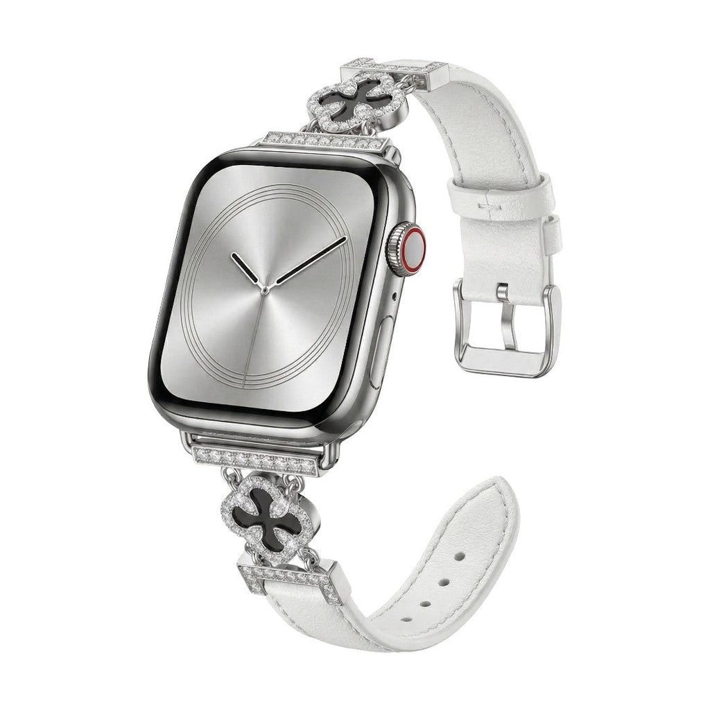 Correa Apple Watch para mujer en material sintético charolado, motivo trébol pavé de circonitas, aleación dorada elegante, modelo Circé