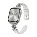 Correa Apple Watch para mujer en material sintético charolado, motivo trébol pavé de circonitas, aleación dorada elegante, modelo Circé