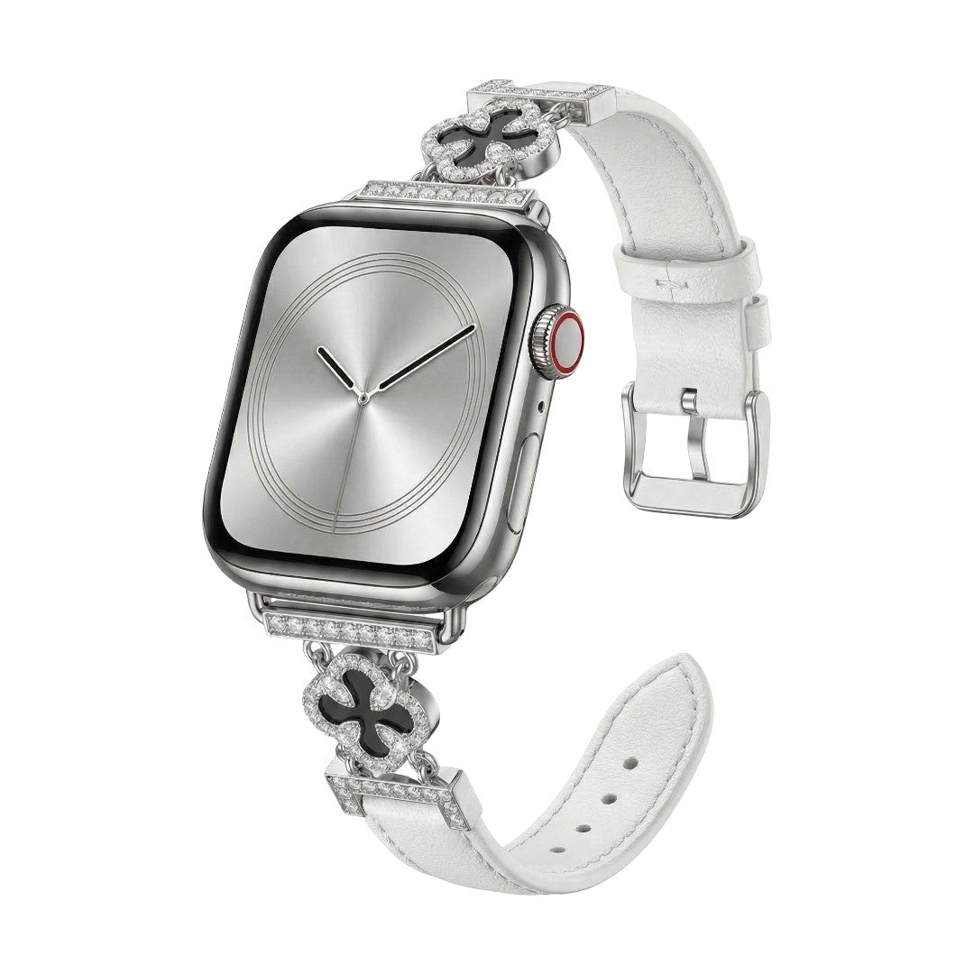 Correa Apple Watch para mujer en material sintético charolado, motivo trébol pavé de circonitas, aleación dorada elegante, modelo Circé