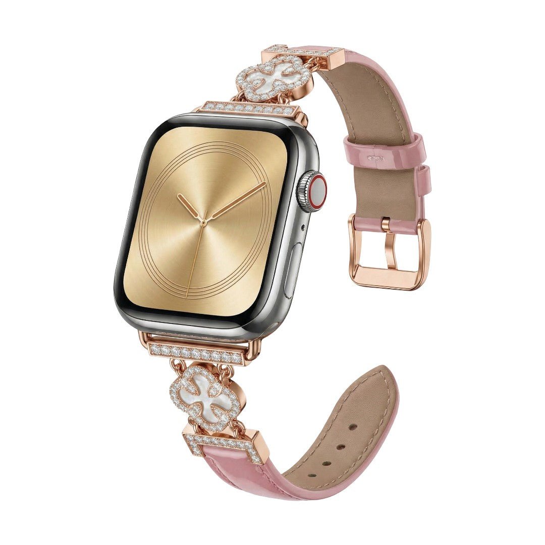 Correa Apple Watch para mujer en material sintético charolado, motivo trébol pavé de circonitas, aleación dorada elegante, modelo Circé