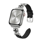 Correa Apple Watch para mujer en material sintético charolado, motivo trébol pavé de circonitas, aleación dorada elegante, modelo Circé