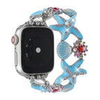 Correa Apple Watch para mujer, motivos marinos, estrellas de mar, conchas, strass de colores, aleación metálica, elástica, modelo Mazia