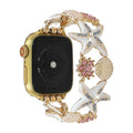 Correa Apple Watch para mujer, motivos marinos, estrellas de mar, conchas, strass de colores, aleación metálica, elástica, modelo Mazia