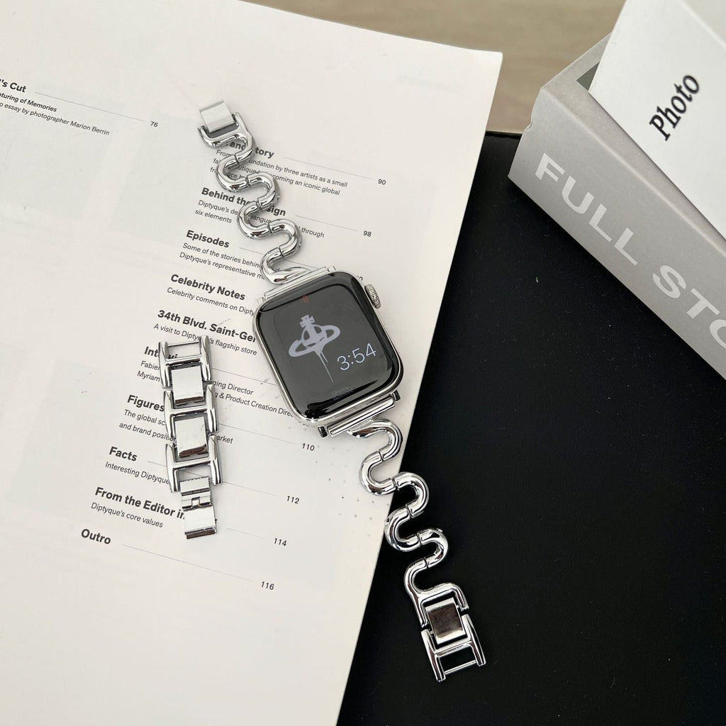 Correa Apple Watch de malla ondulada de metal, diseño moderno en forma de S, cierre de botón a presión ajustable, modelo Sydia