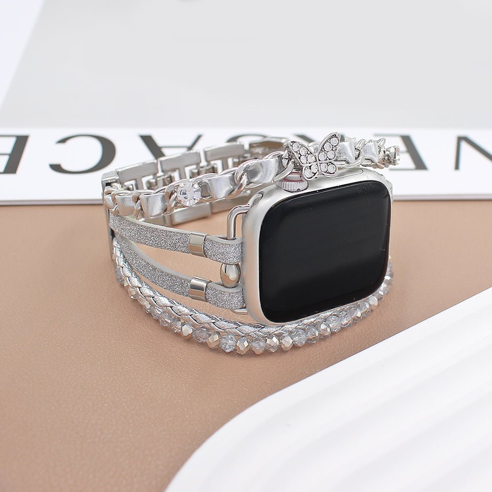 Correa Apple Watch multicapa, ajustable con eslabones y charm de mariposa, chic y elegante, modelo Zoune