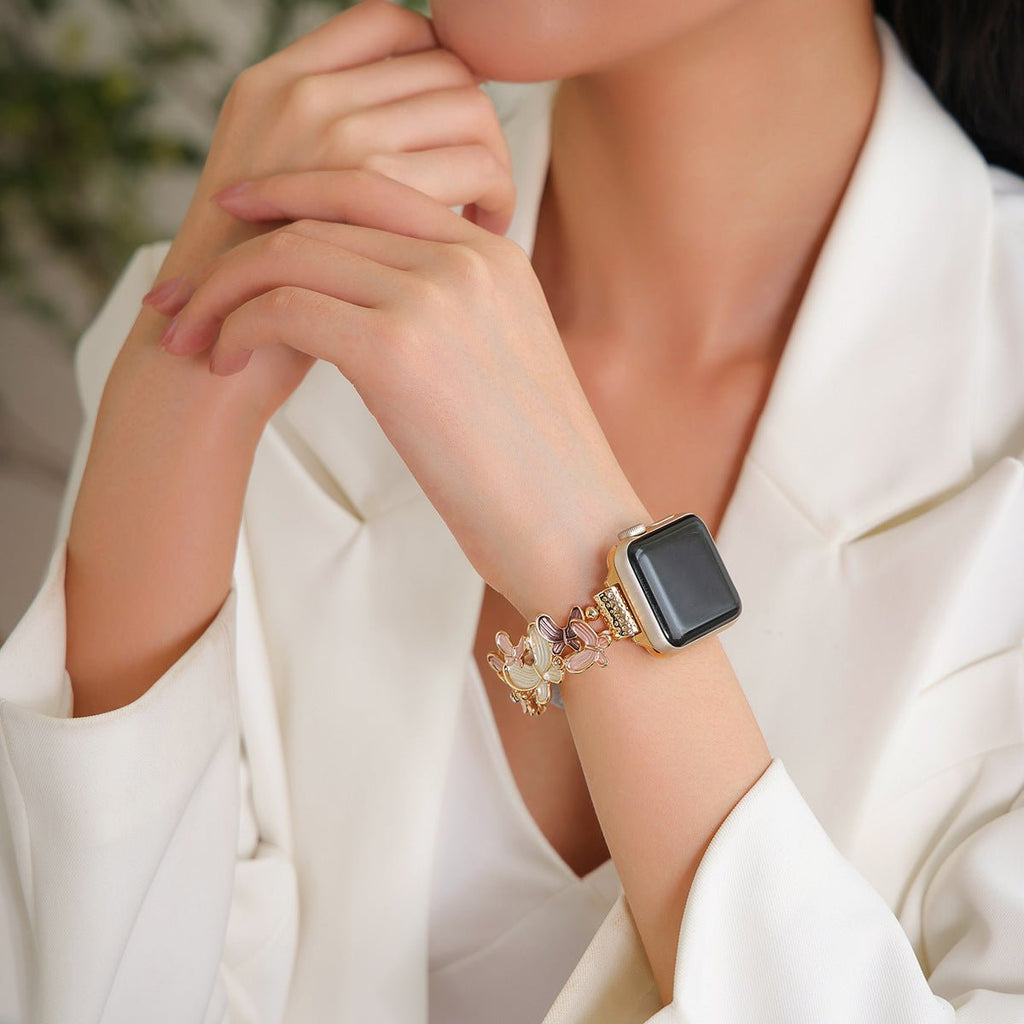 Correa Apple Watch con motivo de mariposas esmaltadas, malla elástica con strass, modelo Marjorie
