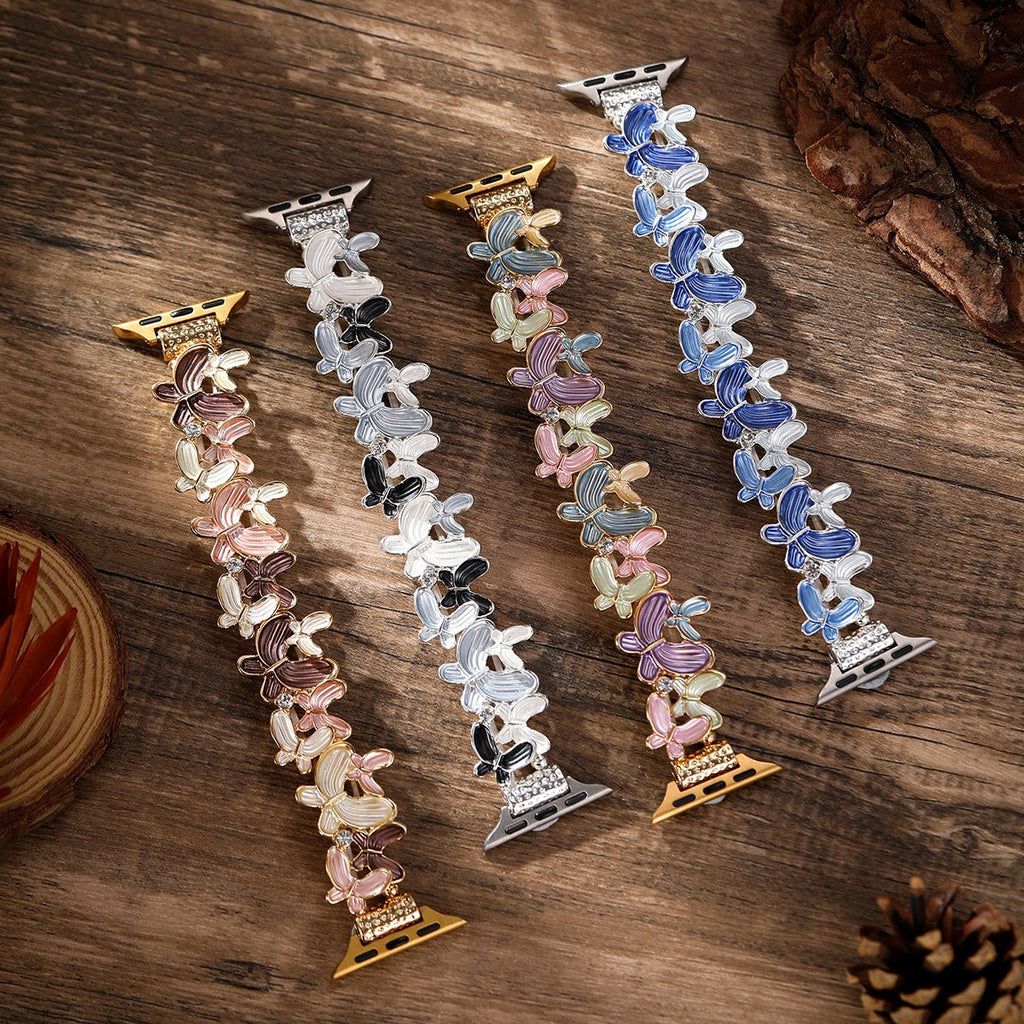 Correa Apple Watch con motivo de mariposas esmaltadas, malla elástica con strass, modelo Marjorie