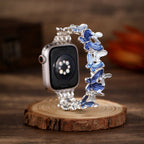 Correa Apple Watch con motivo de mariposas esmaltadas, malla elástica con strass, modelo Marjorie