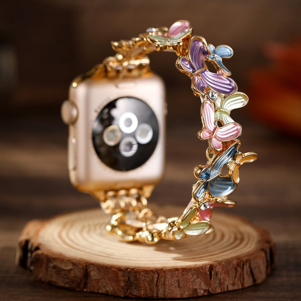 Correa Apple Watch con motivo de mariposas esmaltadas, malla elástica con strass, modelo Marjorie