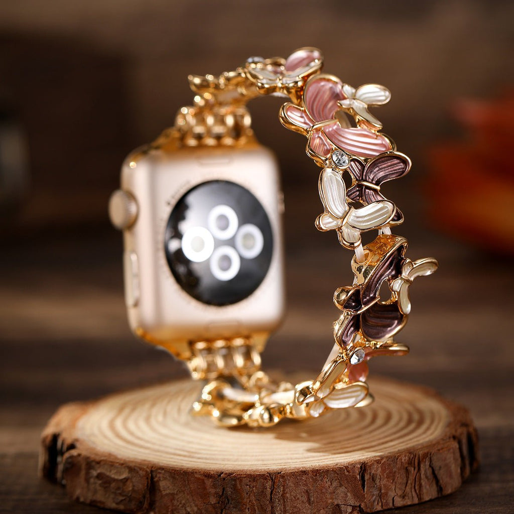 Correa Apple Watch con motivo de mariposas esmaltadas, malla elástica con strass, modelo Marjorie