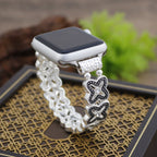 Correa Apple Watch de malla floral calada, pedrería y acabado bicolor, modelo Harpie