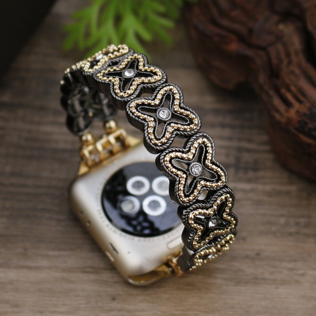 Correa Apple Watch de malla floral calada, pedrería y acabado bicolor, modelo Harpie