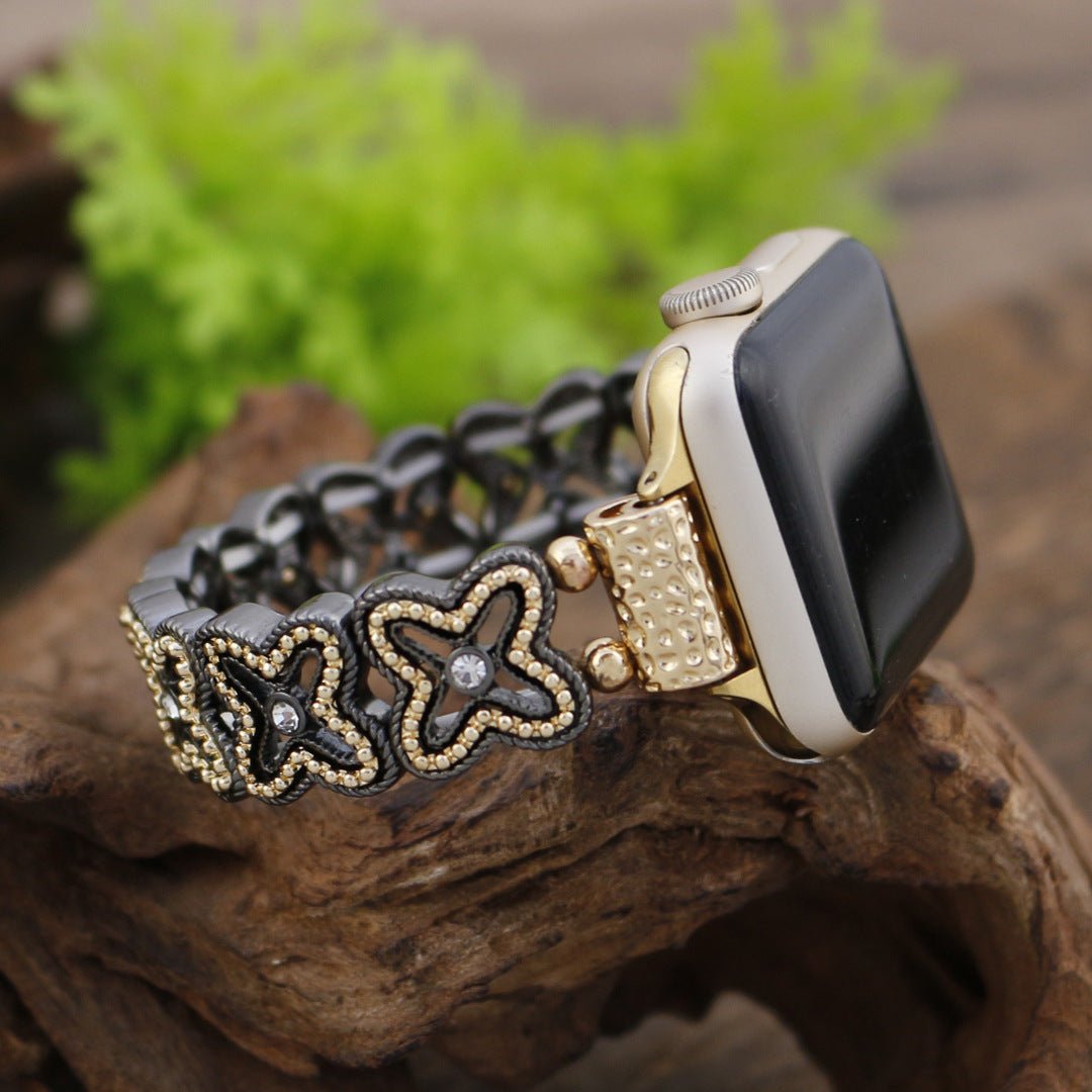 Correa Apple Watch de malla floral calada, pedrería y acabado bicolor, modelo Harpie