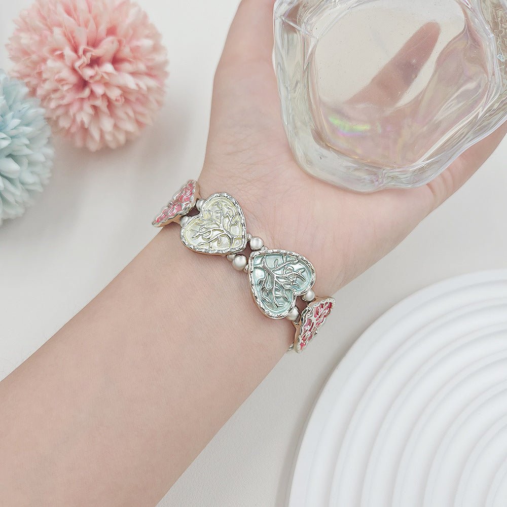 Correa elástica Apple Watch, eslabones de corazón esmaltados con motivo árbol de la vida, modelo Cabra