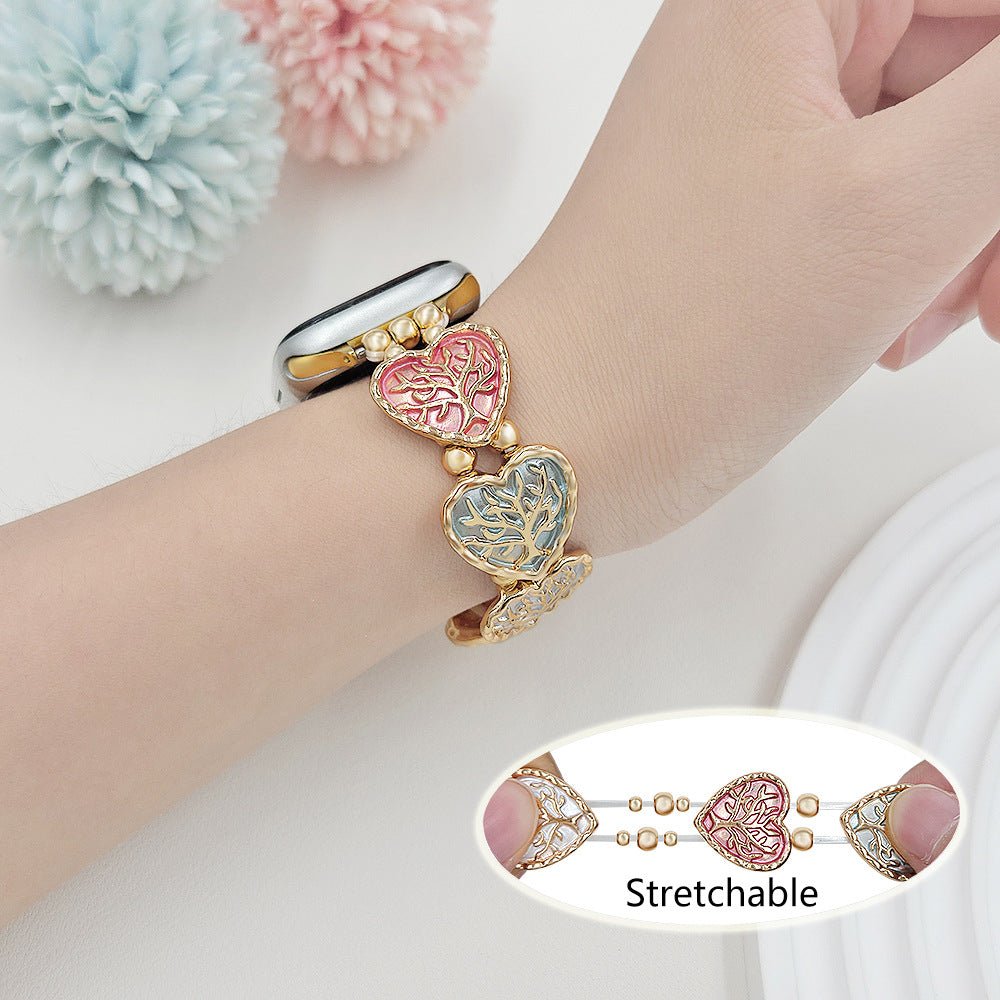 Correa elástica Apple Watch, eslabones de corazón esmaltados con motivo árbol de la vida, modelo Cabra