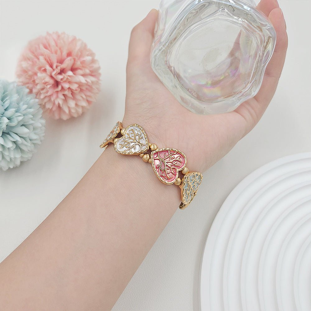 Correa elástica Apple Watch, eslabones de corazón esmaltados con motivo árbol de la vida, modelo Cabra