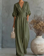 Elegant V-neck high-waisted loose-fit jumpsuit.
