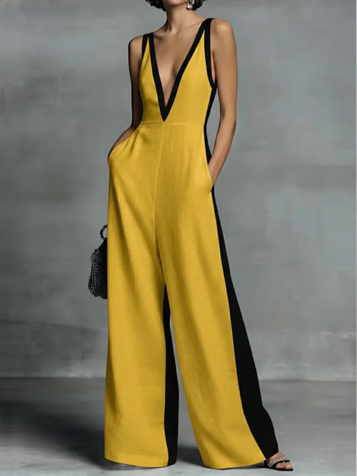 Women's wide-leg jumpsuit with V-neck and contrast trim.
