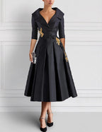 Elegant Satin Midi Dress with Embroidered Floral Appliqué and Folded Lapel Neckline
