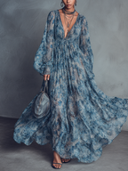 Vestido largo boho de gasa con flores azules y manga farol