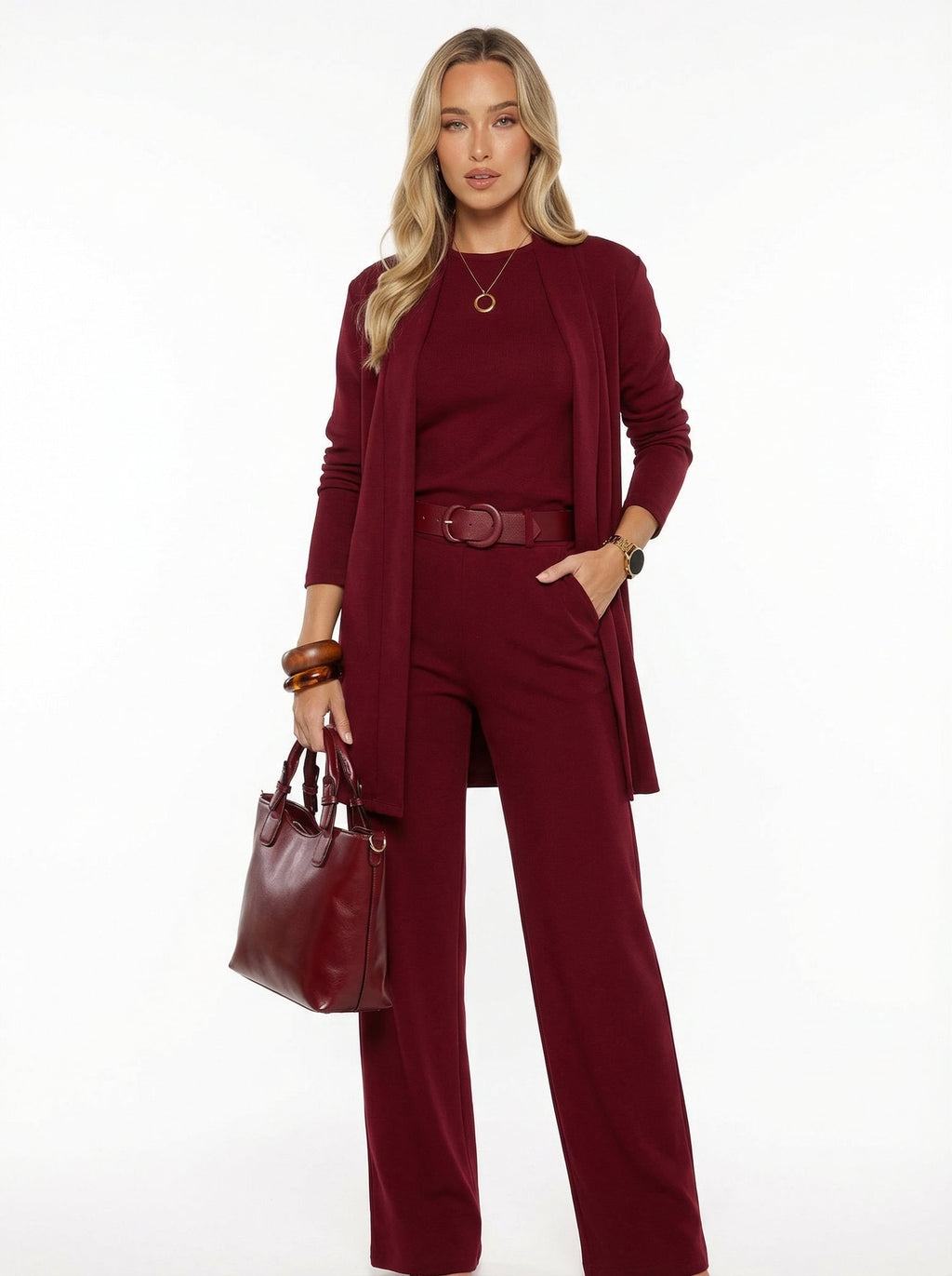 Conjunto cárdigan largo, top y pantalón de punto