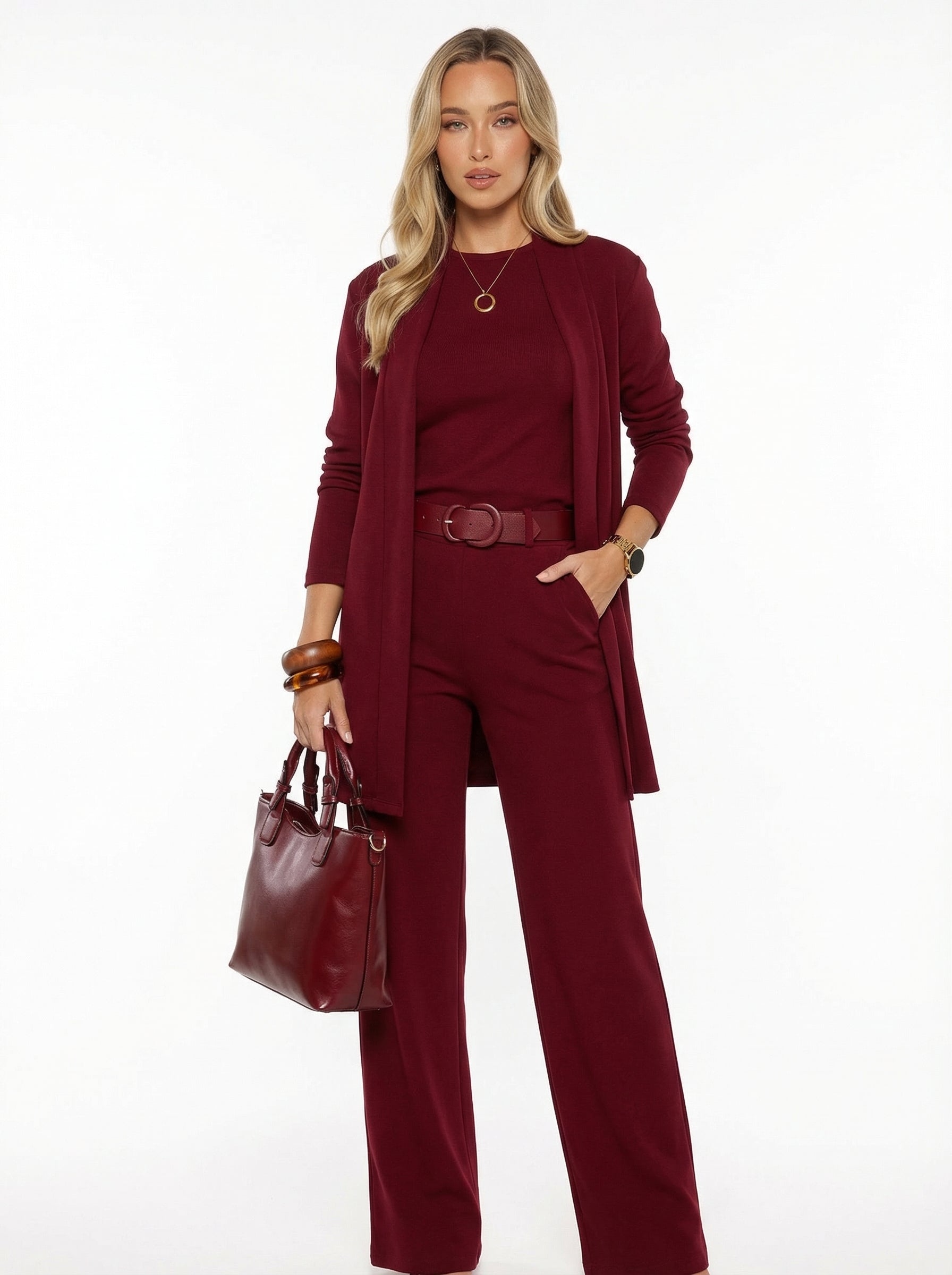 Conjunto cárdigan largo, top y pantalón de punto