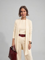 Conjunto cárdigan largo, top y pantalón de punto