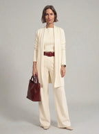 Conjunto cárdigan largo, top y pantalón de punto