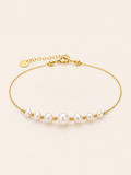 Pulsera de Perlas con Detalles Dorados