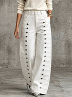 High-rise wide-leg jeans with military-style metal buttons