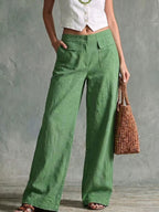 High-rise cotton and linen wide-leg trousers with flap pockets
