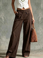 High-rise cotton and linen wide-leg trousers with flap pockets