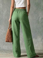 High-rise cotton and linen wide-leg trousers with flap pockets