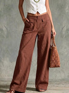 High-rise cotton and linen wide-leg trousers with flap pockets